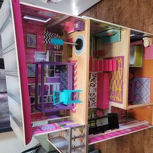 Vibrant Multi-Level Dollhouse with Furniture